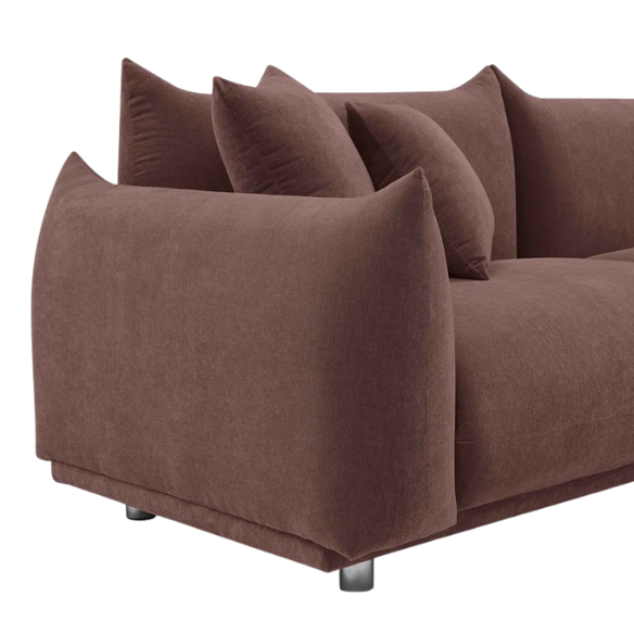 Modern muted brown upholstered sofa with deep seating and chrome-finished legs, featuring four matching accent pillows—ideal for warm, modern interiors.