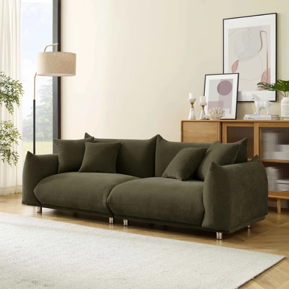 Modern olive drab upholstered sofa with deep seating and chrome-finished legs, featuring 4 matching accent pillows—perfect for modern and rustic interiors.