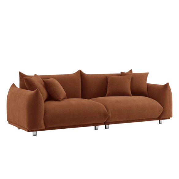 Modern rust upholstered sofa with deep seating and chrome-finished legs, featuring 4 matching accent pillows, perfect for contemporary living rooms.