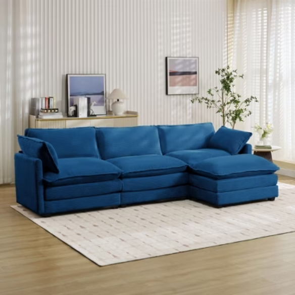 Three-seater navy blue corduroy modular sectional sofa with movable ottoman, modern L-shaped couch for living room with plush cushions and wood-metal frame.
