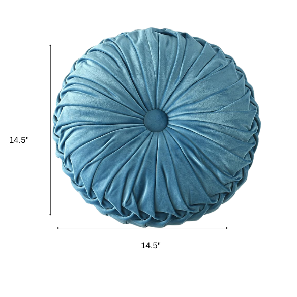 Muted blue velvet round throw pillows with pleated detailing and button center, 14.5-inch set of two styled on a neutral-toned sofa.