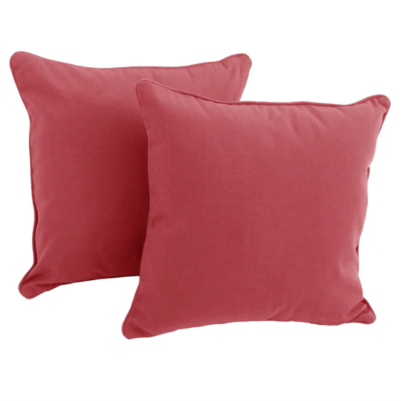 Set of two muted red square throw pillows with corded edges and hidden zipper, perfect for modern or transitional indoor décor