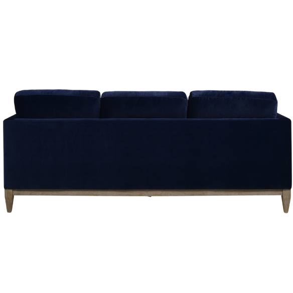 Navy blue velvet 3-seater sofa with feather-down cushions, track arms, and solid wood legs, designed for modern and transitional interiors.