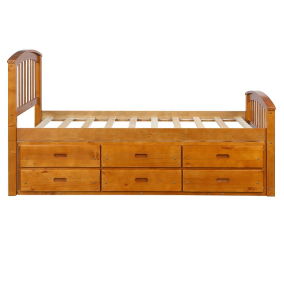 Oak twin bed frame made of solid pine wood with underbed storage drawers, eco-friendly finish, and slatted base, ideal for children or teens in a rustic or modern bedroom.