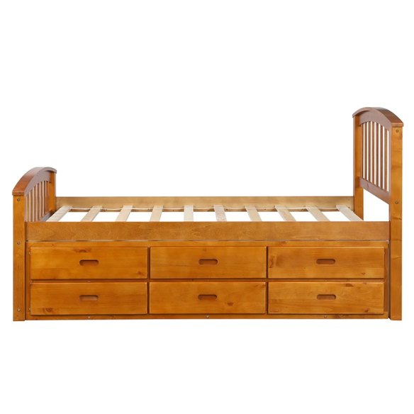 Oak twin bed frame made of solid pine wood with underbed storage drawers, eco-friendly finish, and slatted base, ideal for children or teens in a rustic or modern bedroom.