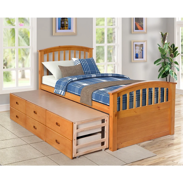 Oak twin bed frame made of solid pine wood with underbed storage drawers, eco-friendly finish, and slatted base, ideal for children or teens in a rustic or modern bedroom.