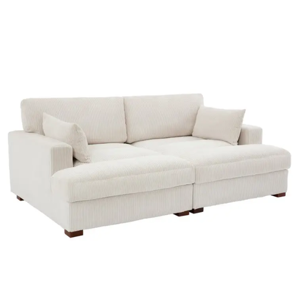 Off-white corduroy convertible sleeper sofa with adjustable headrest, twin bed functionality, and mid-century wooden legs