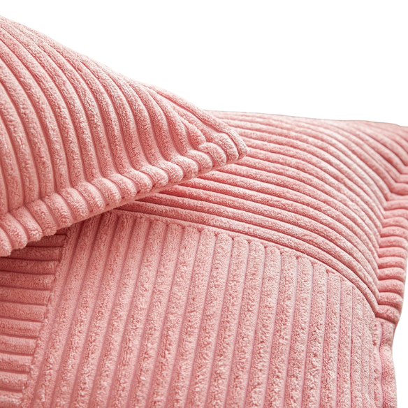 Pink corduroy pillow cover with modern geometric striped pattern, eco-friendly, machine washable, suitable for sofas, bedrooms, offices, and outdoor patios.