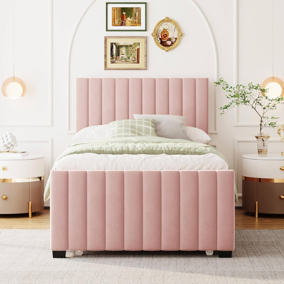 Pink twin upholstered platform bed with tufted velvet headboard and pull-out trundle, designed for kids, teens, or guest rooms, featuring a soft pink finish and space-saving design.