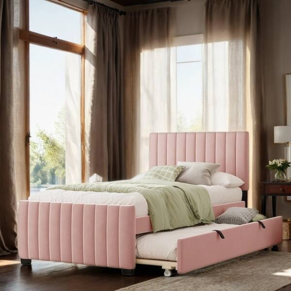 Pink twin upholstered platform bed with tufted velvet headboard and pull-out trundle, designed for kids, teens, or guest rooms, featuring a soft pink finish and space-saving design.