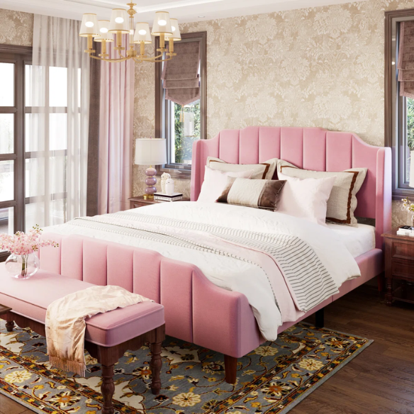 Pink velvet queen platform bed with vertical channel tufted headboard, solid wood frame, and tapered legs – no box spring required
