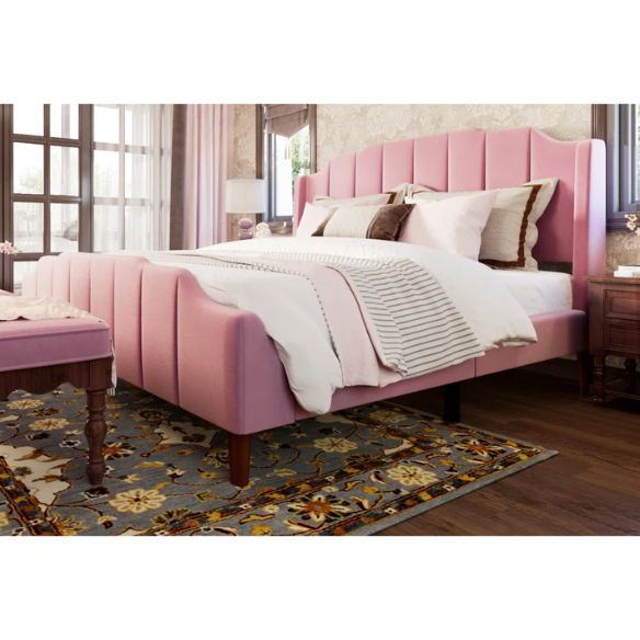 Pink velvet queen platform bed with vertical channel tufted headboard, solid wood frame, and tapered legs – no box spring required