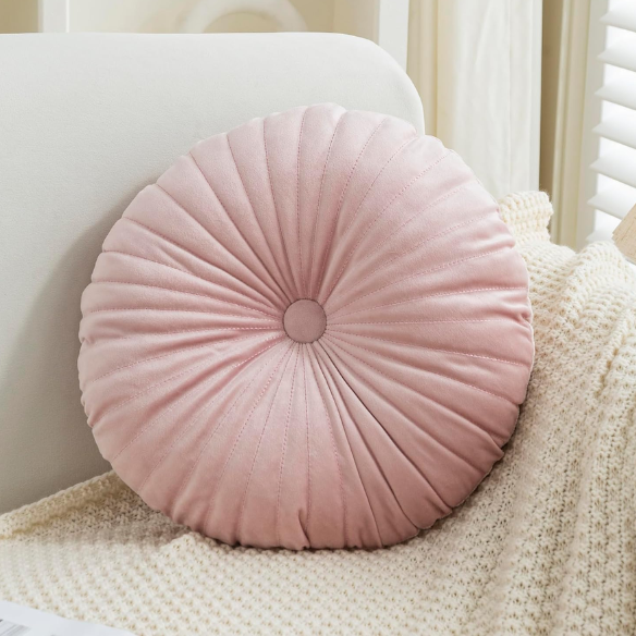 Elegant pink velvet round throw pillow with button closure and pleated design, soft cotton fill for comfort, perfect for sofa, back support, and home décor.
