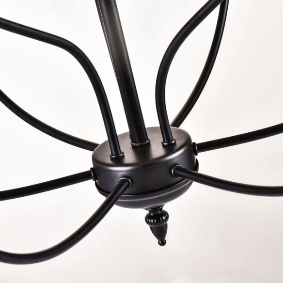 9-light candle-style chandelier with rustic metal finish and curved arms, perfect for farmhouse dining rooms or entryways