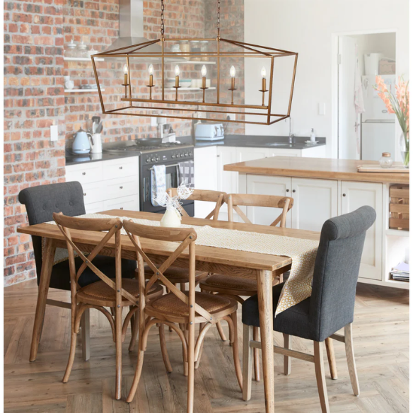 Antique gold lantern-style metal pendant light with exposed LED bulb and adjustable chain, ideal for kitchens or entryways