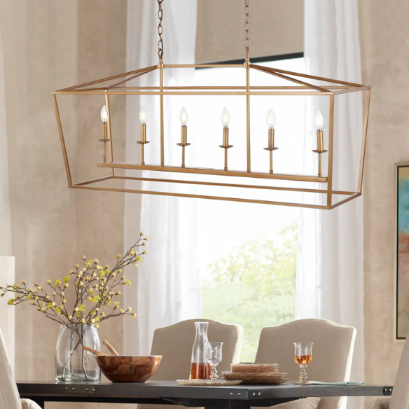 Antique gold lantern-style metal pendant light with exposed LED bulb and adjustable chain, ideal for kitchens or entryways