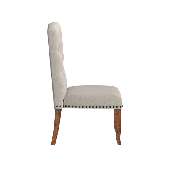 Set of 2 beige button-tufted farmhouse dining chairs with rustic wood legs, nailhead trim, and upholstered linen-like fabric.