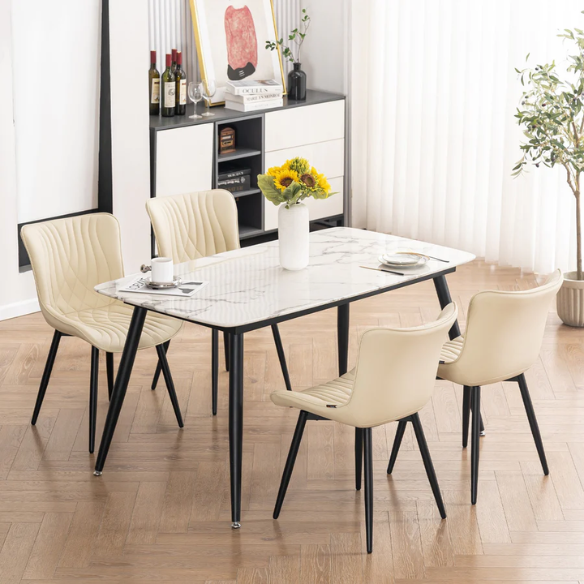Set of 2 beige faux leather dining chairs with modern fishtail backrest and black metal legs, designed for contemporary dining spaces.