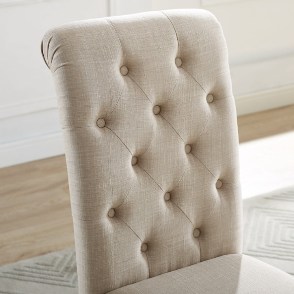 Set of 2 beige tufted high-back dining chairs with espresso wood legs and soft polyester upholstery—perfect for classic or transitional dining spaces.