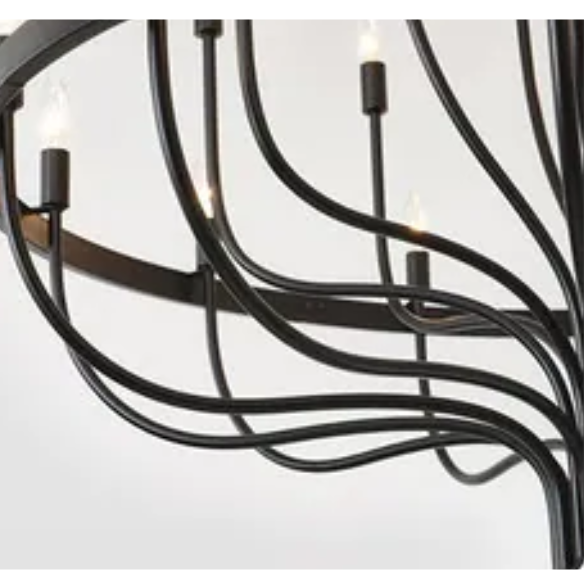 Oversized black farmhouse chandelier with 33 candle-style lights on a wagon wheel frame, ideal for high ceilings, dining rooms, and entryways