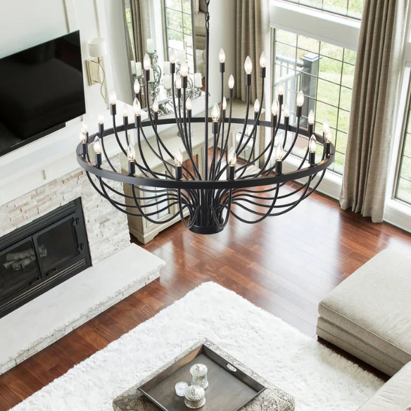 Oversized black farmhouse chandelier with 33 candle-style lights on a wagon wheel frame, ideal for high ceilings, dining rooms, and entryways