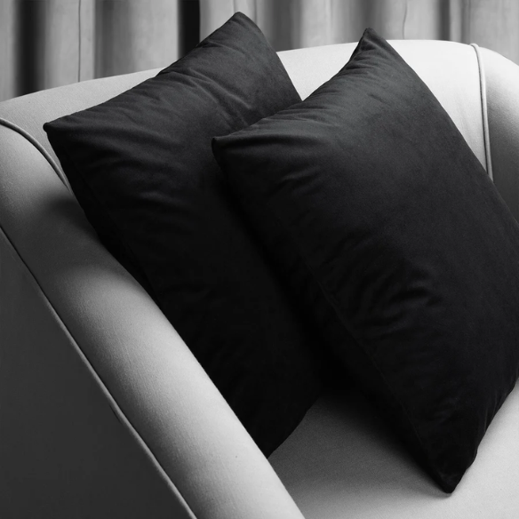 Set of 2 luxury black pillow covers with zipper closure for modern home decor, perfect for living rooms, bedrooms, and sofas.