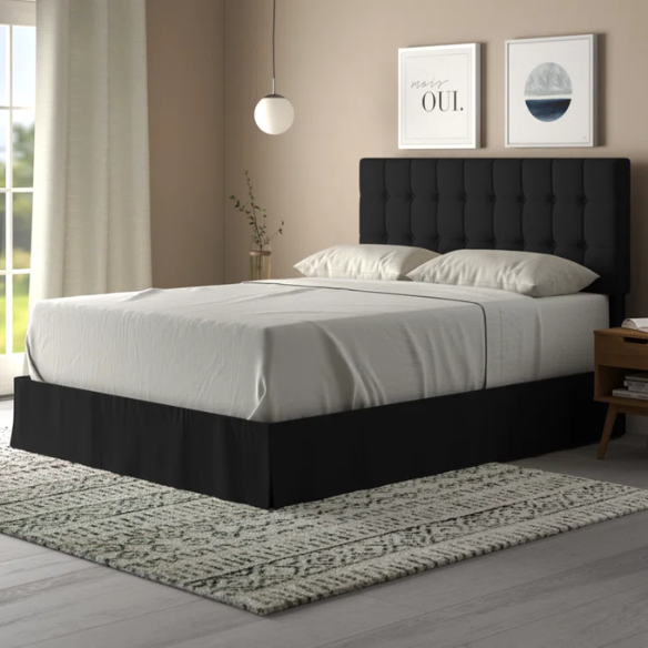 Black queen size bed with tufted wingback headboard, polyester upholstery, and nailhead trim.