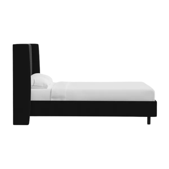 Black king-size upholstered bed in twill fabric with wingback headboard and low-profile black metal legs.