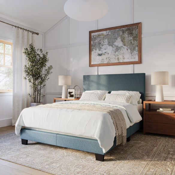 Full-size blue upholstered bed with polyester fabric, tall foam-padded rectangular headboard, and modern clean-line design.