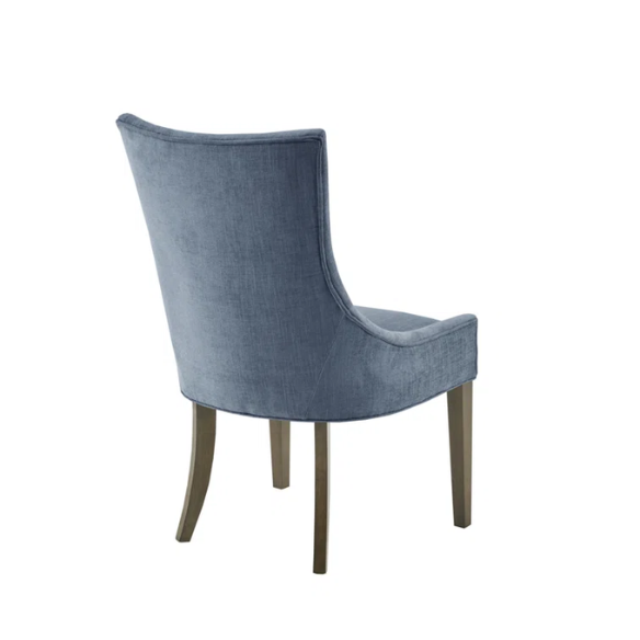 Set of 2 upholstered armless dining chairs in rich blue chenille with solid wood legs, high backs, and piped detailing.