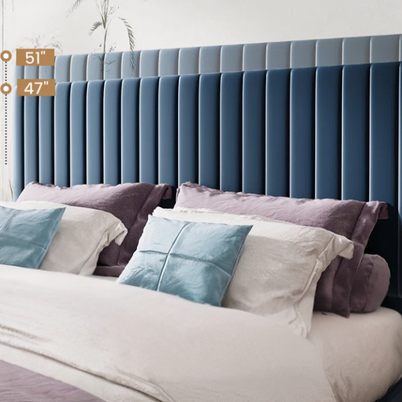 Blue velvet upholstered queen bed with tufted rectangular headboard and low-profile frame.