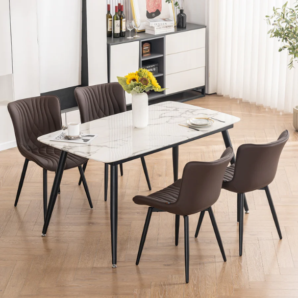 Set of 2 brown faux leather dining chairs with fishtail tufted backs and black metal legs, ideal for modern or rustic dining spaces.