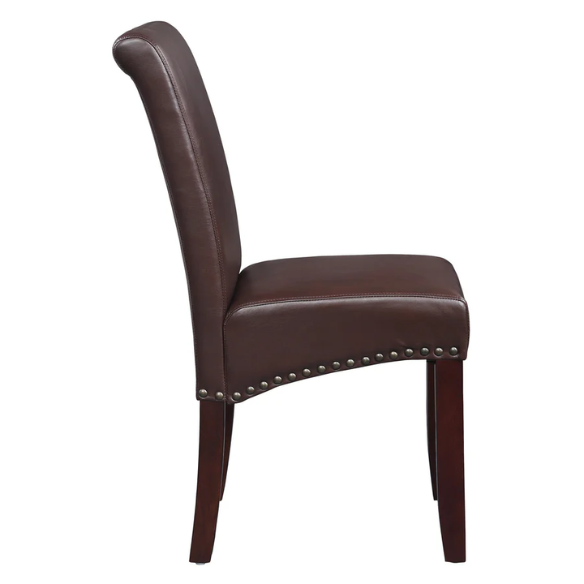 Brown faux leather Parsons chair with scrolled back, antique bronze nailhead trim, and solid wood legs