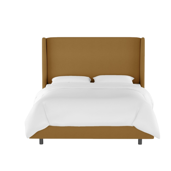 Camel king-size upholstered bed in velvet fabric with wingback headboard and low-profile black metal legs.