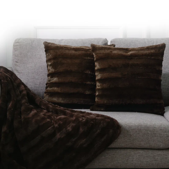 Set of two chocolate brown faux fur throw pillows, 18x18 inches, square decorative cushions with soft microfiber filling—ideal for sofas, beds, and cozy reading corners