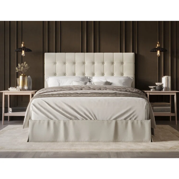 Cream queen bed with tufted wingback headboard and nailhead trim, upholstered in polyester fabric.