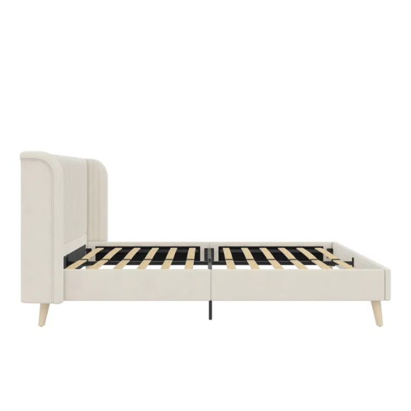 Light cream velvet upholstered queen platform bed with wingback tufted headboard and mid-century angled wood legs.