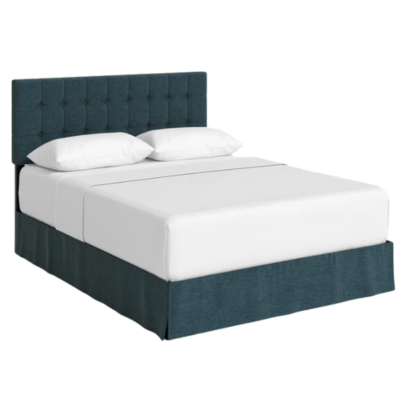Denim blue upholstered queen bed with tufted wingback headboard and nailhead trim on wood and metal frame.