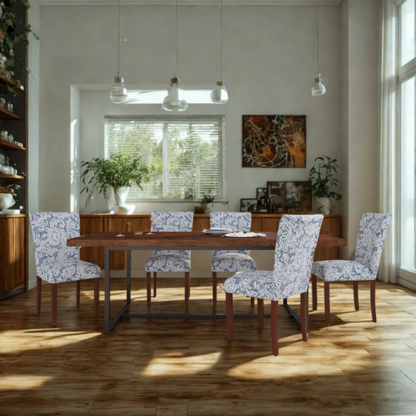 Set of two Parsons dining chairs with denim blue and white floral upholstery, high back design, scalloped seat front, and wood legs