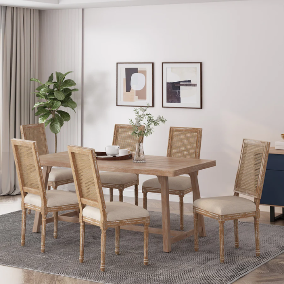 Set of 6 rustic French country-style dining chairs featuring natural wood frames, cane backrests, and soft beige upholstered seat cushions.