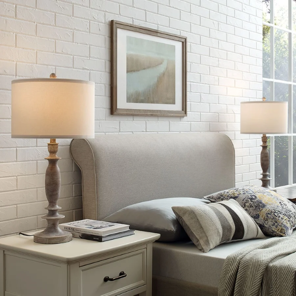 Set of 2 farmhouse-style 29-inch table lamps with hand-painted wood finish, white linen drum shades, and energy-efficient LED bulbs