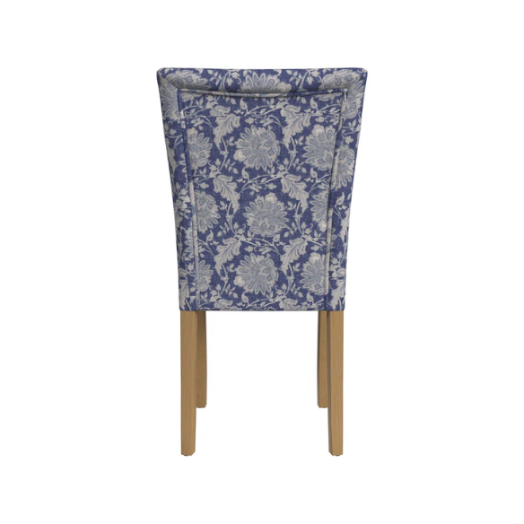 Set of two blue and cream floral Parsons dining chairs with high back, scalloped seat front, and wood legs in a traditional design
