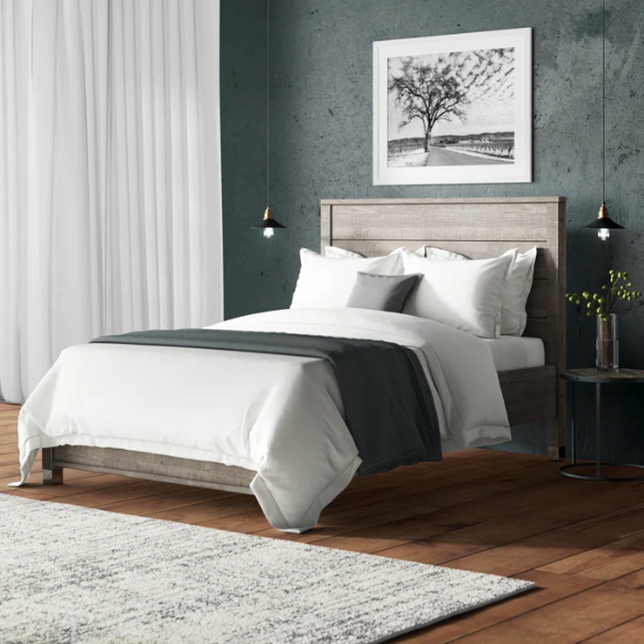 Full-size rustic grey farmhouse bed made of solid pine wood with a distressed finish, rectangular headboard, and platform slat support.