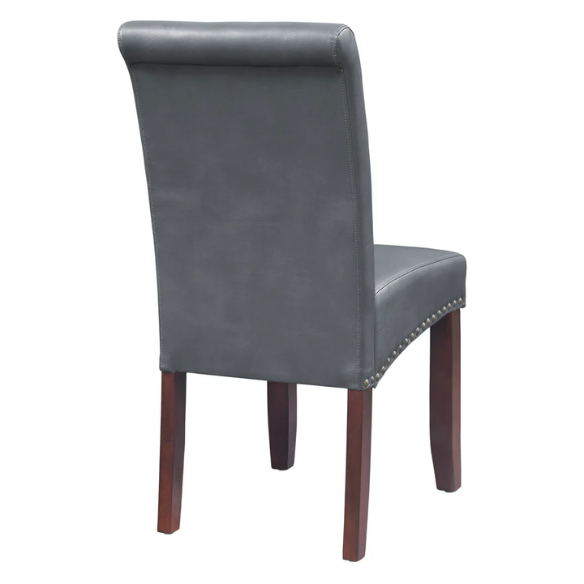 Grey leather Parsons chair with high back, scrolled shoulders, antique bronze nailhead trim, and solid wood legs