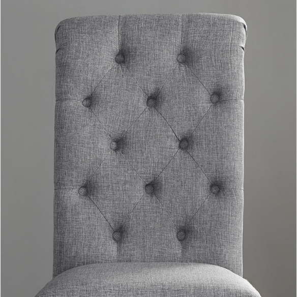 Set of 2 grey tufted high-back dining chairs with espresso-finished solid wood legs and foam-padded polyester upholstery—ideal for farmhouse and modern dining spaces.