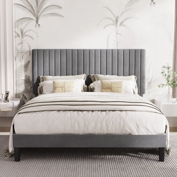 Grey velvet upholstered queen bed with tufted rectangular headboard and low-profile frame.