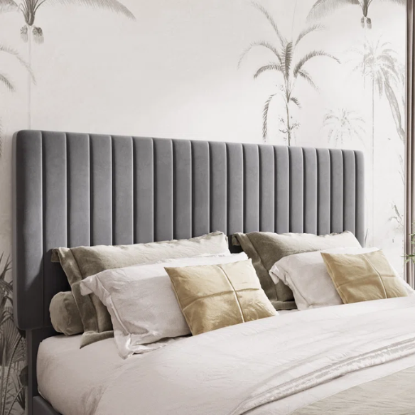 Grey velvet upholstered queen bed with tufted rectangular headboard and low-profile frame.