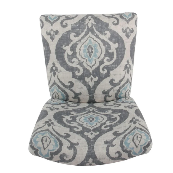 Set of two Parsons dining chairs with grey, white, and light blue floral upholstery, high back design, scalloped seat front, and wood legs