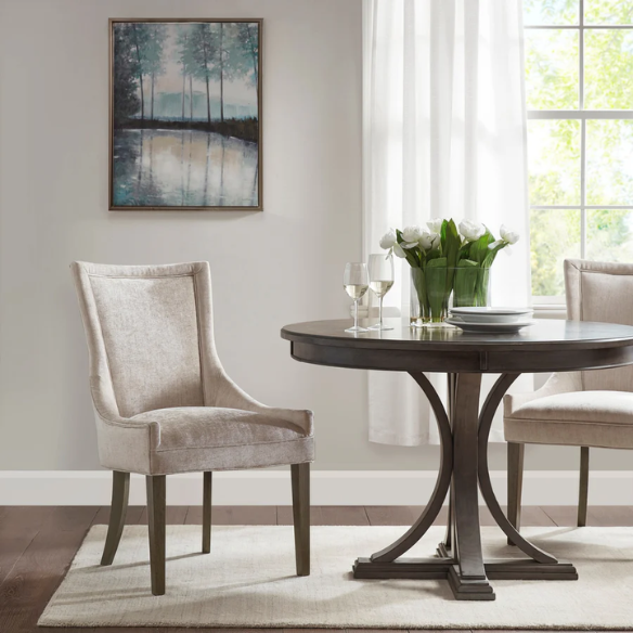 Set of 2 upholstered armless dining chairs in light beige with solid wood legs, high backrest, and elegant piping detail.