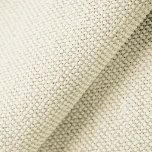 Light cream king-size upholstered bed in textured tweed fabric with wingback headboard and low-profile black metal legs.